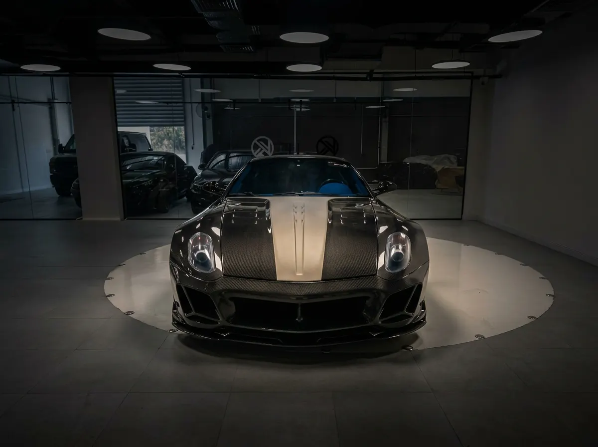 599 RF one-of-one by Kynetik Koncepts — exposed carbon fibre bodywork, front view in the Dubai showroom