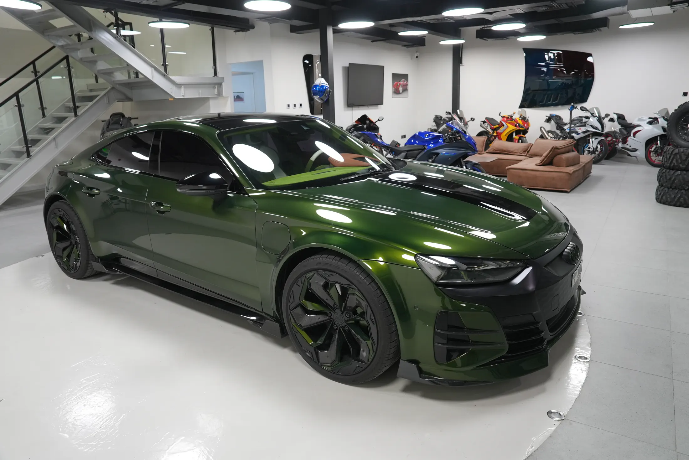 Audi RS e-tron GT by Kynetik Koncepts — front three-quarter in the workshop