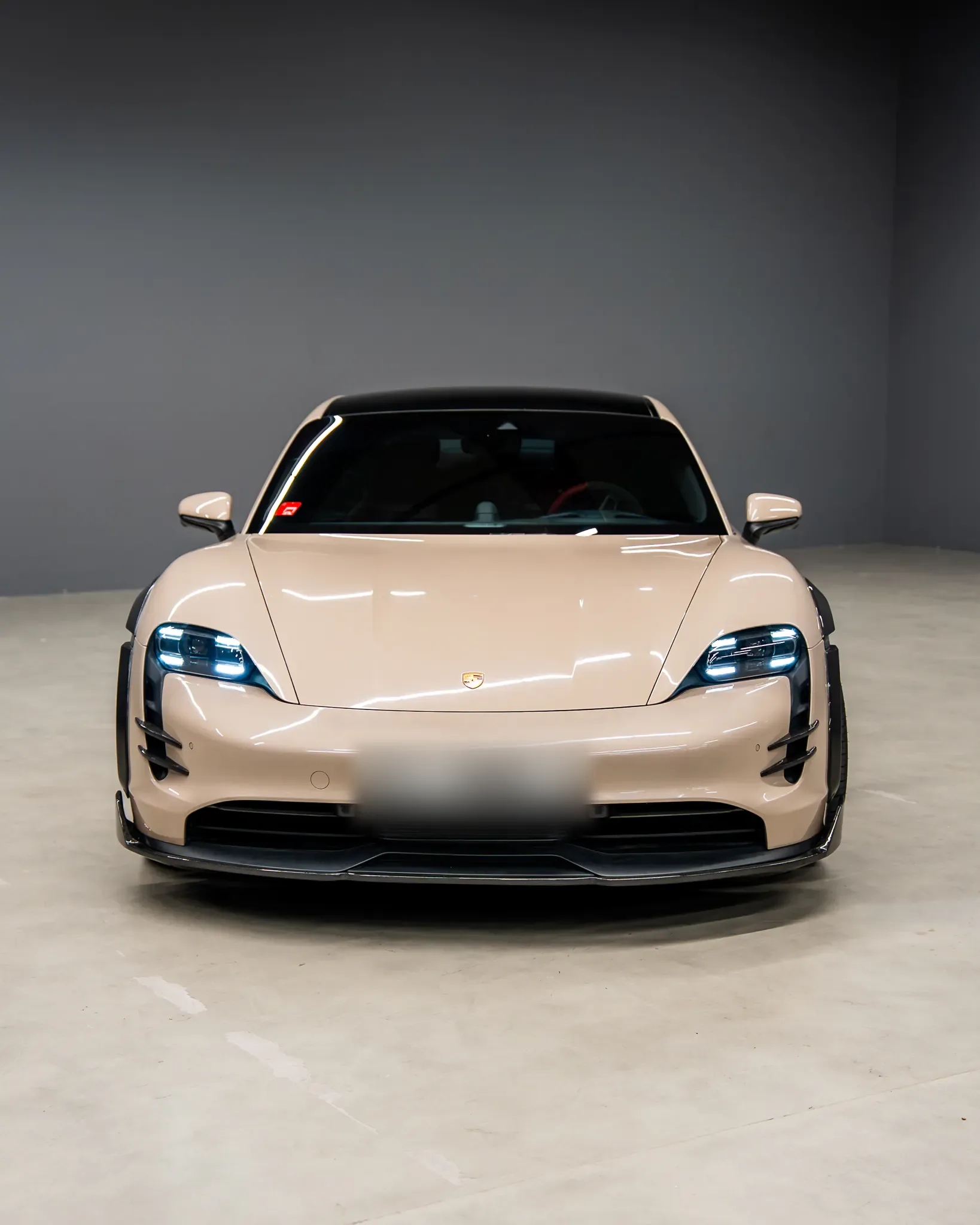 Porsche Taycan by Kynetik Koncepts — front, carbon intake blades