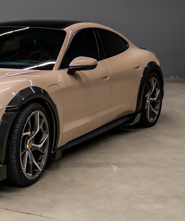 Porsche Taycan by Kynetik Koncepts — side three-quarter along the wheel and chassis line